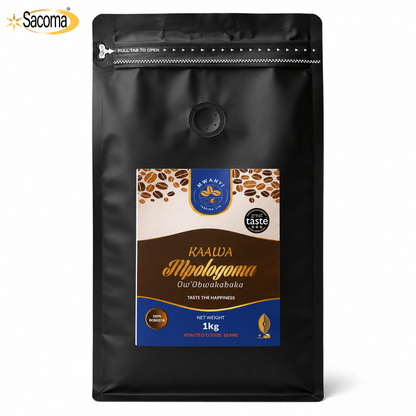 A 1kg black stand-up pouch of Kaa'wa Molo'opoma (Ou'Uhuahuhubaka) coffee by Taste the Difference, featuring a colorful front label and a Sacoma logo in the top left corner.
