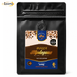 A 250g bag of Kaawa Moplogoma Roasted Coffee Beans by Sacoma, in a black resealable stand-up pouch with a colorful front label.