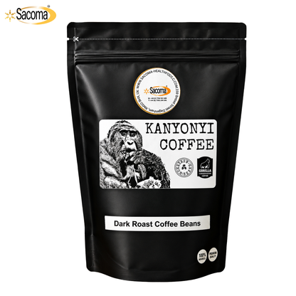 A black stand-up pouch of Sacoma Kanyoni Coffee Dark Roast Coffee Beans, featuring a white label with a gorilla illustration and product details, on a white background.