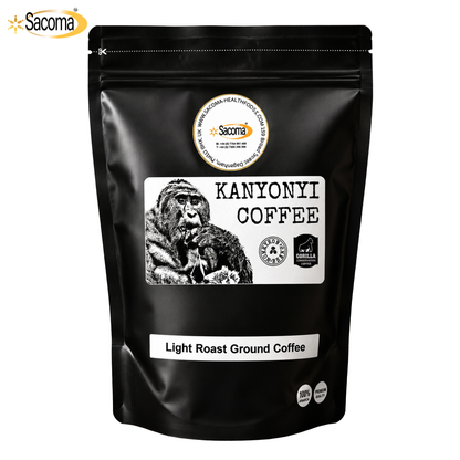A black stand-up pouch of Sacoma Kanyoni Coffee Light Roast Ground Coffee, featuring a white label with a gorilla illustration and certification logos, on a white background.