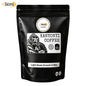 A black stand-up pouch of Sacoma Kanyoni Coffee Light Roast Ground Coffee, featuring a white label with a gorilla illustration and certification logos, on a white background.