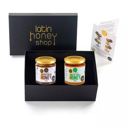 Two jars of honey in a black box with 'Latin Honey Shop' branding.